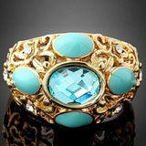 PRETTY !  18K GOLD PLATED CREATED BLUE TOPAZ DESIGNER RING - Wholesalekings.com